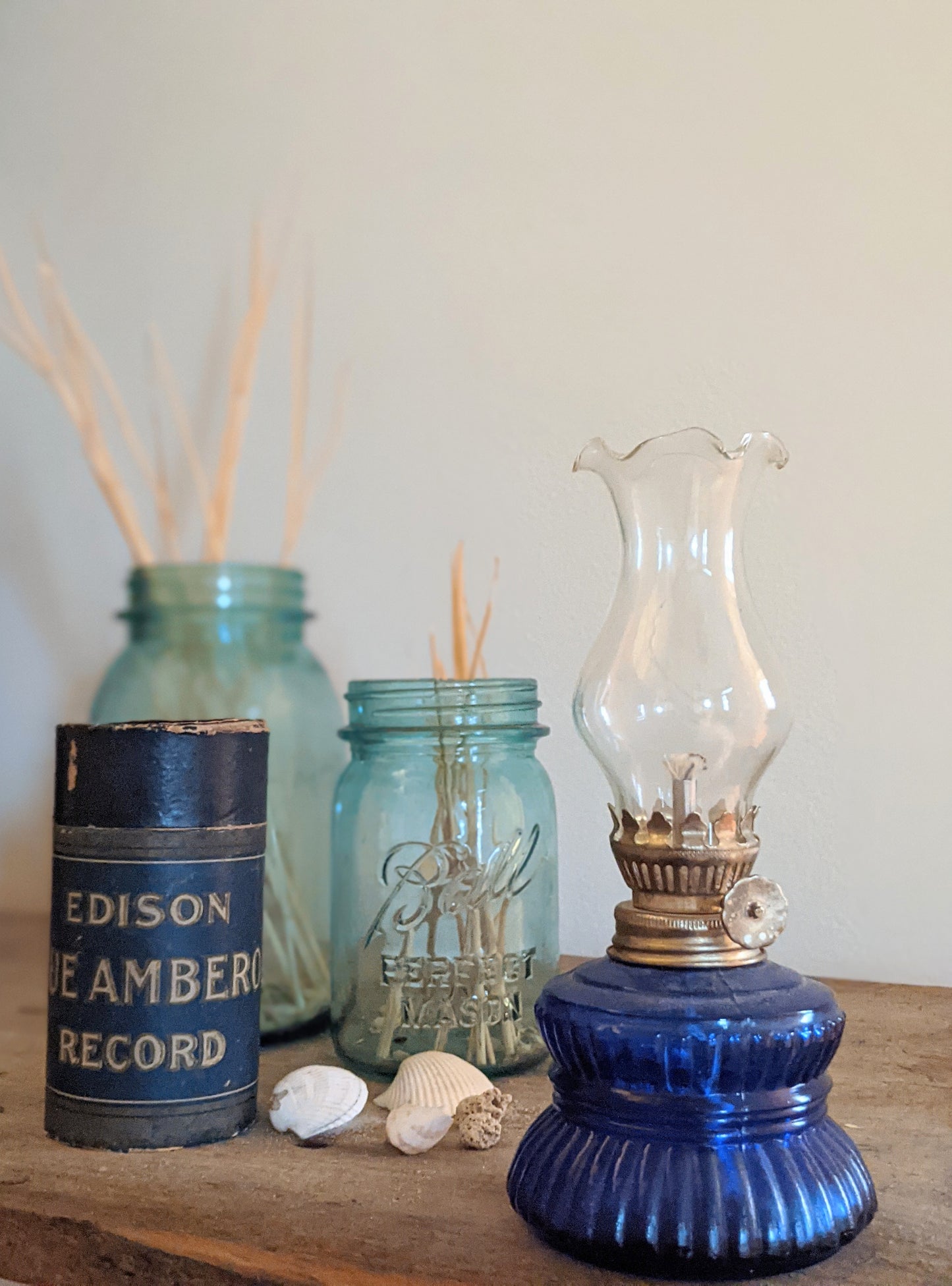 Coastal grandmother oil lamp with a blue base